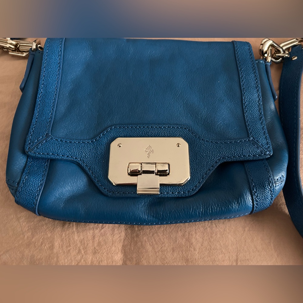 Small blue Cole haan crossbody.  Never used. Perfect condition